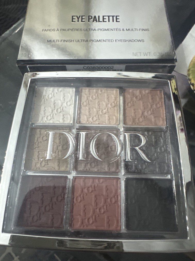 Dior Backstage 003 Warm Essentials Eye Palette (Category: Makeup) located in Angeles City. Submitted by migs_font29 (Listing ID 1456925897, Image 1). Description: - Dior Backstage Eye Palette in 003 Warm Essentials - Features 9 ultra-pigmented eyeshadow shades - Includes a mix of matte, satin, and shimmer finishes - Dior logo embossed on central shades - Comes in original packaging.