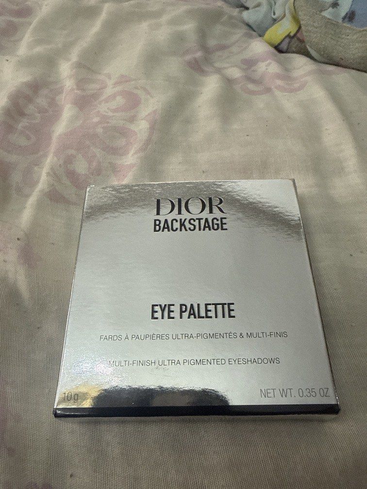 DIOR BACKSTAGE 004 Celestial Purple Eye Palette (Category: Makeup) located in Angeles City. Submitted by migs_font29 (Listing ID 1456923048, Image 1). Description: - Dior Backstage Eye Palette - Shade: 004 Celestial Purple - Contains 9 ultra-pigmented eyeshadows - Finishes: Satin and Shimmer - Shades include: Satin Pearl, Satin Coral, Satin Bronze, Shimmer Lilac, Shimmer Pink, Satin Plum, Satin Silver, Shimmer Icy Blue, Velvet Deep Blue - Net wei