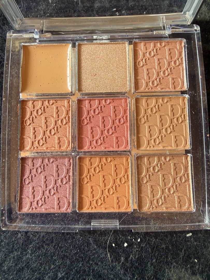 Dior Backstage Eye Palette 007 Coral Neutrals (Category: Makeup) located in Angeles City. Submitted by migs_font29 (Listing ID 1456924381, Image 2). Description: - Dior Backstage Eye Palette in 007 Coral Neutrals - Features 9 versatile eyeshadow shades - Includes a primer and highlighter - Finishes: shimmer, sculpting powder, matte, and metal - Color range: deep mauve, pink coral, copper brown, warm bronze - Perfect for creating a variety of eye 
