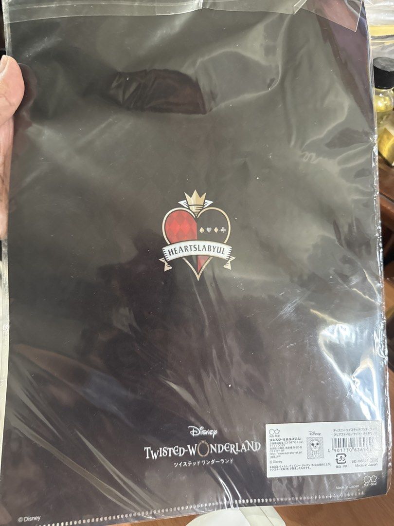 Disney Twisted-Wonderland Cater Diamond Folder (Category: Stationery & School Supplies) located in Manila. Submitted by eicho (Listing ID 1456810464, Image 2). Description: - Official Disney Twisted-Wonderland folder - Features Cater Diamond from Heartslabyul - Brand new, still in original packaging - Ideal for organizing documents or as a collectible - A must-have for fans of the game/anime.