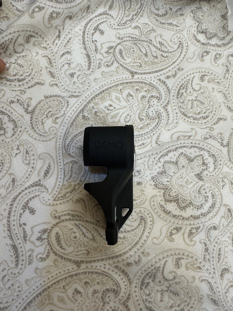 DJI Osmo pocket 4 gimbal Mount Clip (Category: Mounts & Holders) located in Manila. Submitted by allthatjazz.ph (Listing ID 1456841845, Image 1). Description: - original osmo pocket 4 gimbal clip - Black phone holder mount for DJI Osmo - Securely attaches your smartphone to the gimbal - Easy to clip on and off - Ideal for vlogging and filming with your phone - Please check photos for exact details I wont use it since i have a case already - it do