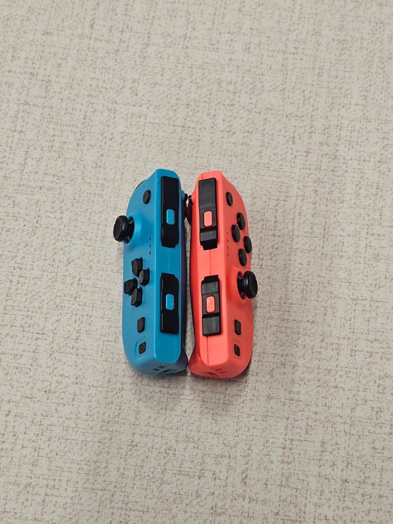 Dobe Switch Controller (Category: Nintendo) located in Shah Alam. Submitted by yellowcoatstore (Listing ID 1456867168, Image 2). Description: Impulse purchase, end up underutilized. Used it like below 10 times. All button and functionality good condition. COD Klang Valley..