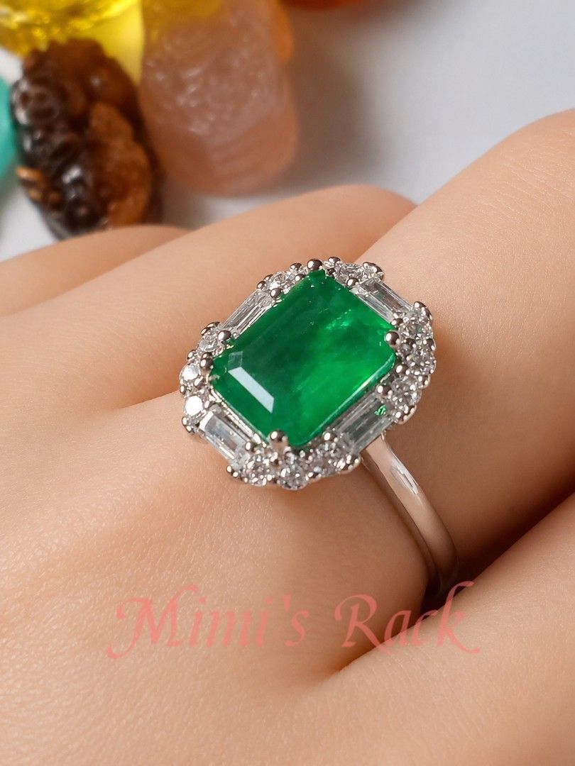 Emerald Luxe Statement Ring | Elegant (Category: Rings) located in Taguig. Submitted by mimisrack (Listing ID 1456824559, Image 3). Description: 💚A truly eye-catching emerald statement ring featuring a vivid green emerald-cut center stone surrounded by a beautifully detailed halo of clear accent stones. 💚✨ -The rich emerald green paired with the surrounding stones gives this ring an elegant, luxurious and timeless look—perfect for anyone who lo