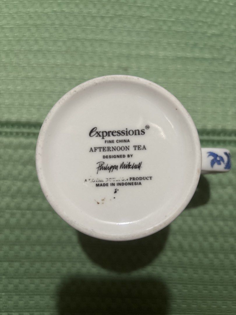 Expressions Fine China Afternoon Tea Mug by Philippa Mitchell (Category: Coffee & Tea Tableware) located in Taguig. Submitted by fatzy24 (Listing ID 1456950073, Image 2). Description: - Expressions Fine China mug - 'Afternoon Tea' design by Philippa Mitchell - Beautiful blue and white pattern - Accented with yellow roses and a menu illustration - Made in Indonesia - Ideal for your morning coffee or afternoon tea.