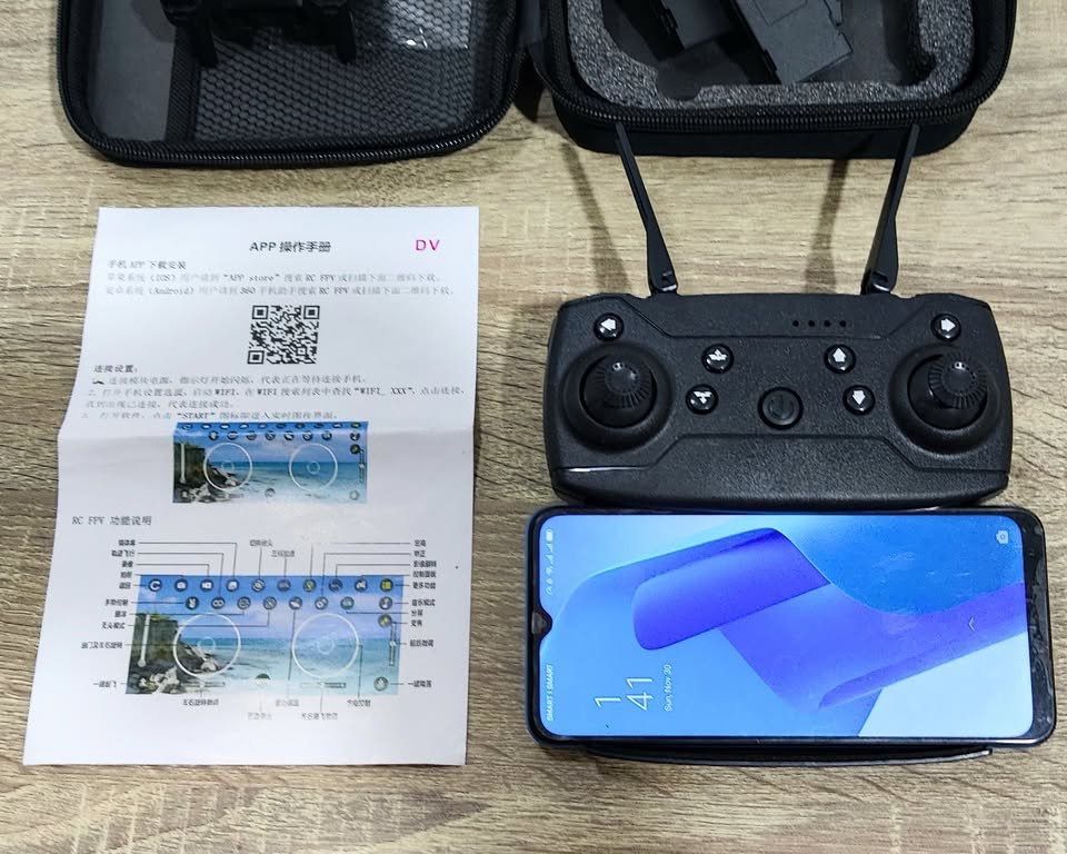 Foldable Drone with Remote Control and Extra Batteries (Category: Drones) located in Quezon City. Submitted by jakewinrat86766 (Listing ID 1456824647, Image 3). Description: Model name: Mini Drone Pro with Camera + 3 extra batteries. Comes with: spare blades, screwdriver, blades protections and 3 rechargeable batteries and instruction. Available Google Play Android application to connect your phone and see real time image and adjust addition opti