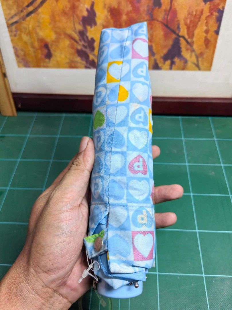 Folding Umbrella (Category: Umbrellas) located in Cebu City. Submitted by dudes_villanueva (Listing ID 1456905635, Image 2). Description: Folding Umbrella - Blue Hearts Like New ☔ In excellent condition. Diameter : 38 inches Length Folded : 9.25 inches.