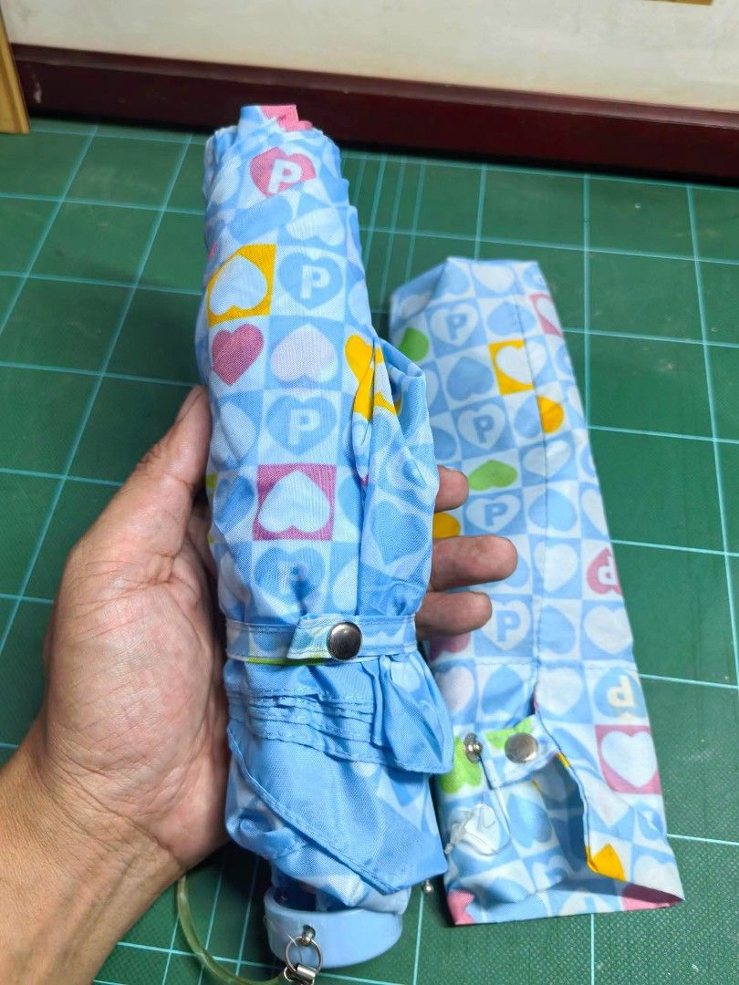 Folding Umbrella (Category: Umbrellas) located in Cebu City. Submitted by dudes_villanueva (Listing ID 1456905635, Image 3). Description: Folding Umbrella - Blue Hearts Like New ☔ In excellent condition. Diameter : 38 inches Length Folded : 9.25 inches.