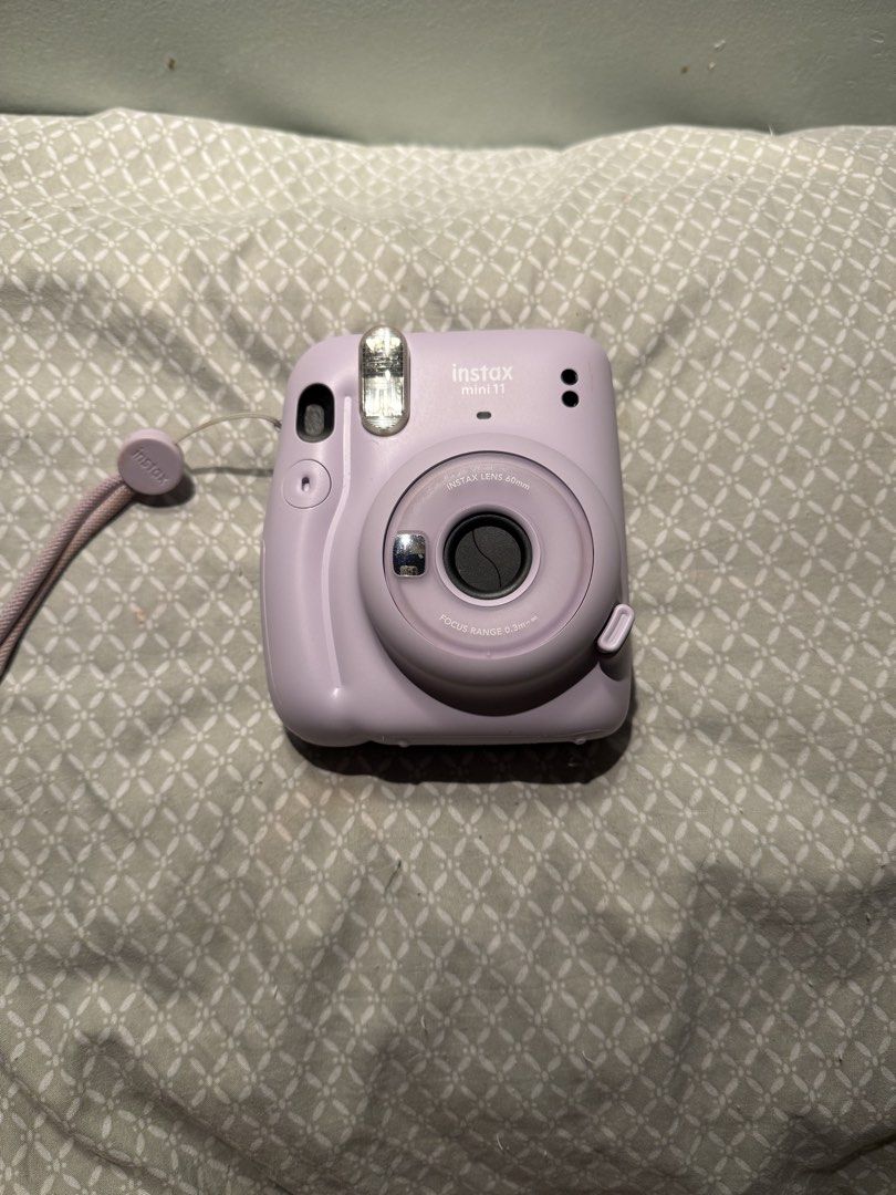 Fujifilm Instax Mini 11 Lilac Instant Camera (Category: Cameras) located in Manila. Submitted by inbituin (Listing ID 1456921081, Image 1). Description: - Fujifilm Instax Mini 11 instant camera - Lovely lilac color - Easy to use for instant photos - Captures fun memories - Comes with a wrist strap - Great for parties and everyday snapshots.