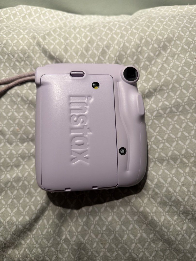 Fujifilm Instax Mini 11 Lilac Instant Camera (Category: Cameras) located in Manila. Submitted by inbituin (Listing ID 1456921081, Image 2). Description: - Fujifilm Instax Mini 11 instant camera - Lovely lilac color - Easy to use for instant photos - Captures fun memories - Comes with a wrist strap - Great for parties and everyday snapshots.