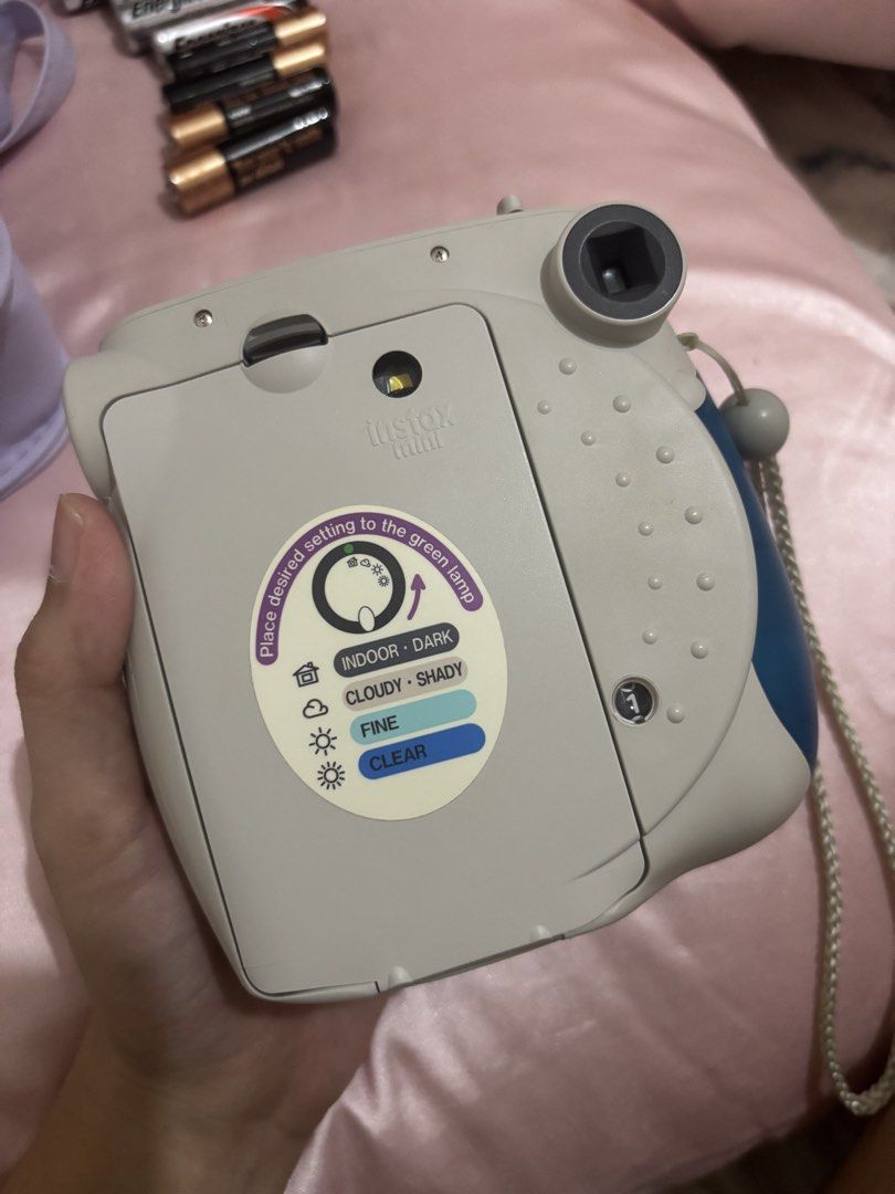 Fujifilm Instax Mini 7S (Category: Cameras) located in Manila. Submitted by michaelaji75732 (Listing ID 1456893071, Image 2). Description: This unit was barely used. No scratch, issue, flaw. All buttons are working. Flash is working. Clear viewfinder. RFS: need cash Inclusions: Camera bag in purple 4 duracell AA batteries (these were the original batteries the camera came with and it’s still working) 4 additional energizer AA batteries.