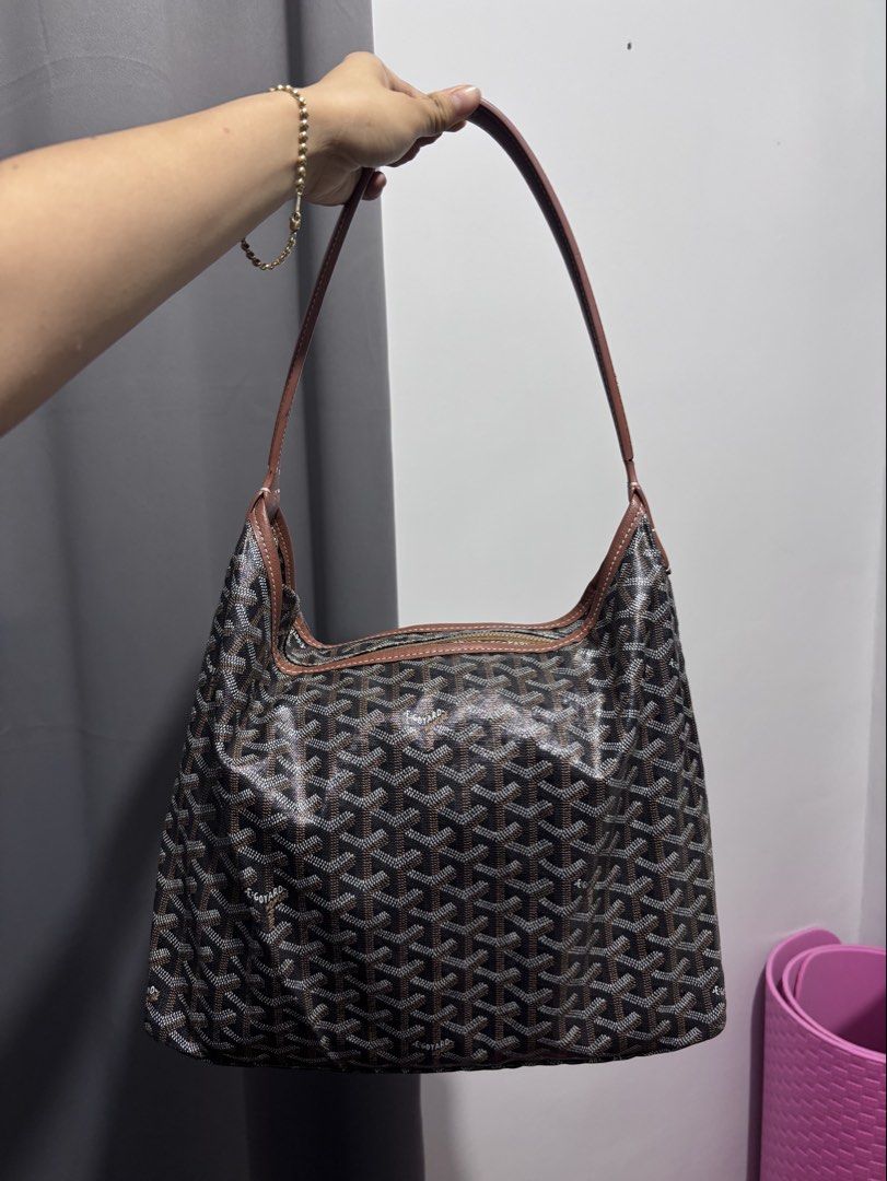 Goyard boheme hobo bag (Category: Luxury Bags & Wallets) located in Dagupan City. Submitted by raregrail.co (Listing ID 1456913827, Image 1). Description: - Classic brown black monogram pattern - Specious interior - includes matching original pouch - minimal issue you can see at the photo .