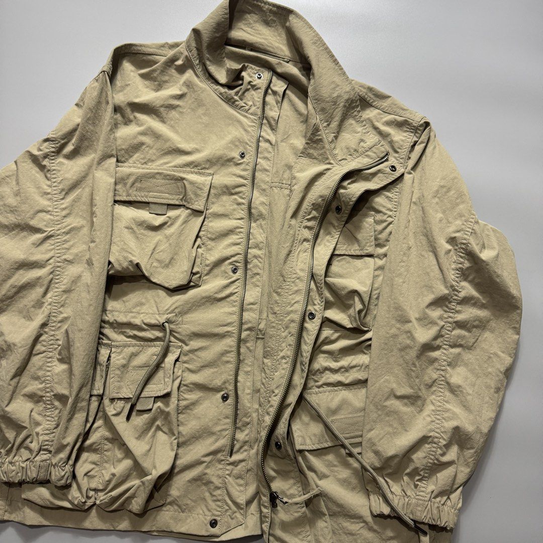 GU Military Jungle Fatigue Jacket (Category: Coats, Jackets and Outerwear) located in Santa Cruz. Submitted by bigsteppa.tiger (Listing ID 1456937938, Image 3). Description: GU Military-Inspired Field Jacket Jungle jacket-inspired piece with multi-pocket utility design, drawcord waist and high collar. Width – 23 Length – 28 Jungle jacket-inspired piece with multi-pocket utility design, drawcord waist and high collar. Width – 23 Length – 28.