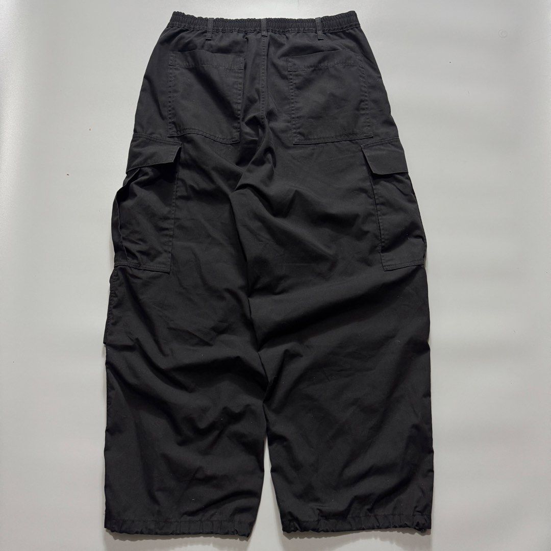 GU Military-Inspired Parachute Cargo Pants (Category: Other Bottoms) located in Santa Cruz. Submitted by bigsteppa.tiger (Listing ID 1456935160, Image 2). Description: GU Military-Inspired Parachute Cargo Pants Military-inspired parachute pants with a relaxed wide fit and functional pocket detailing. Great condition Waist - 30 to 34 Length - 41 Hem - 10.