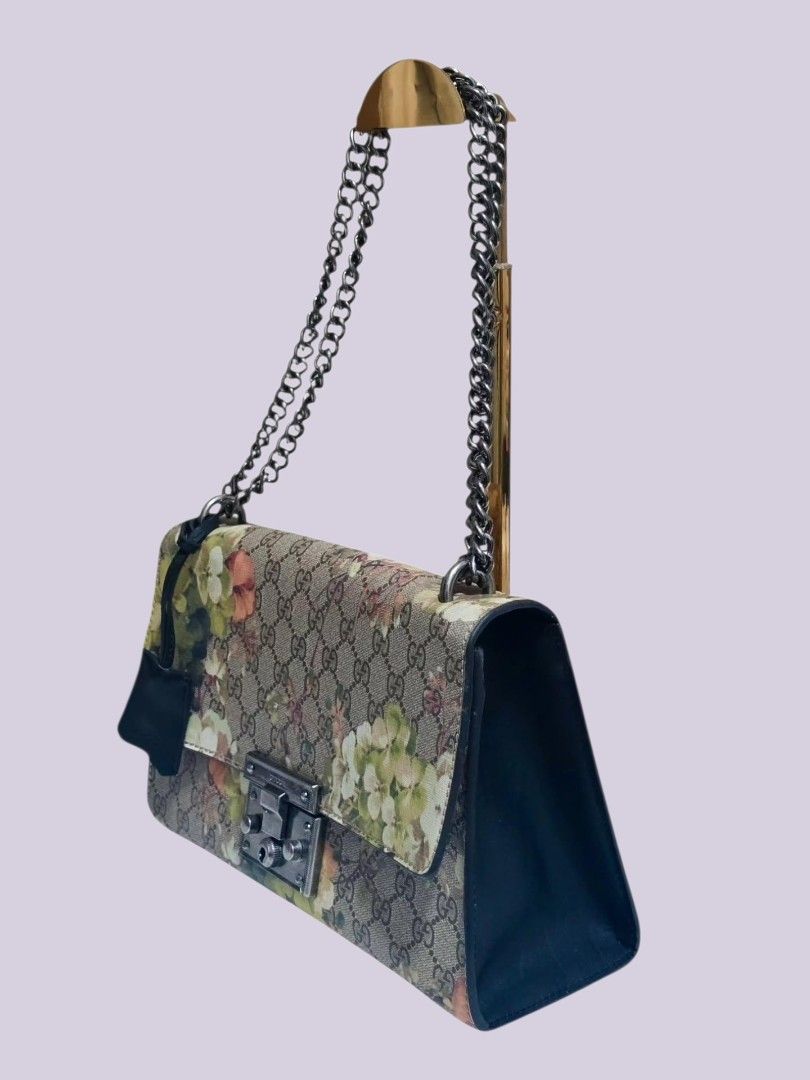 Gucci GG Blooms Padlock Shoulder Bag (Category: Shoulder Bags) located in Pili. Submitted by love.purse (Listing ID 1456835630, Image 2). Description: - N.G.A. - from 🇯🇵 ukay - Used G.ụcci Blooms padlock shoulder bag - Iconic G G Supreme canvas with beautiful floral print - Aged Silver-tone hardware and chain strap - Interior lined in black leather with a zip pocket - Secure lock closure on the front flap - Perfect statement piece for any outfi