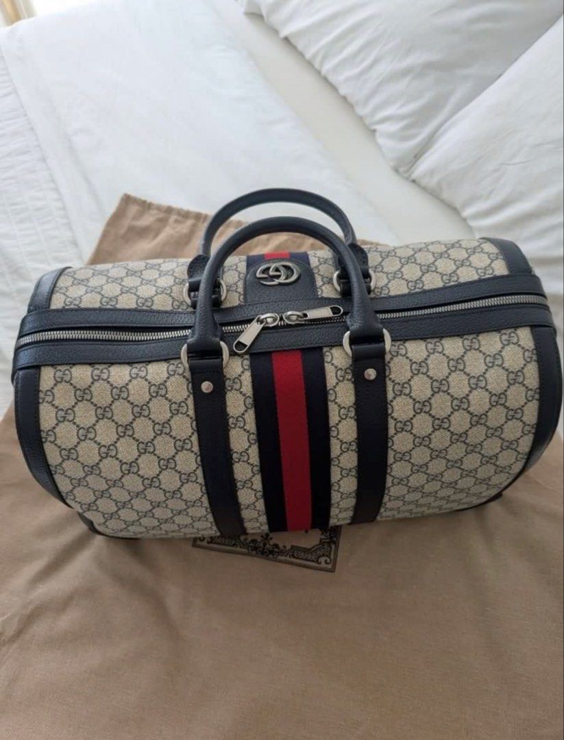 Gucci Savoy Duffle Bag (medium) (Category: Luxury Bags & Wallets) located in Las Pinas. Submitted by jmxhobbies (Listing ID 1456953967, Image 2). Description: Selling my brand new Gucci Savoy Duffle Bag (medium) Complete set Adjustable shoulder strap Detachable key holder and lock Dust Bag Price is firm Payment: Bank Transfer GCash Price is fixed Delivery: Lalamove Grab.