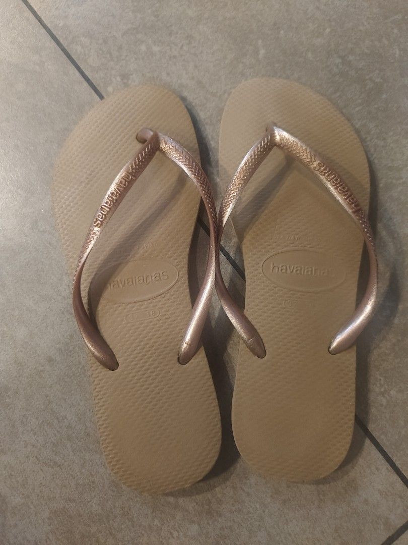 Havaianas Slim Flip Flops - Various Colors & Sizes (Category: Slippers and slides) located in Muntinlupa City. Submitted by cezzy82 (Listing ID 1456854904, Image 2). Description: 580 pesos each - Brand: Havaianas Slim - Sizes Available: 37/38 (EUR) / 7/8 (US) - Colors: Black, Dark Green, Rose Gold, Champagne Gold - Perfect for: Beach days, casual wear - Features: Comfortable, durable.