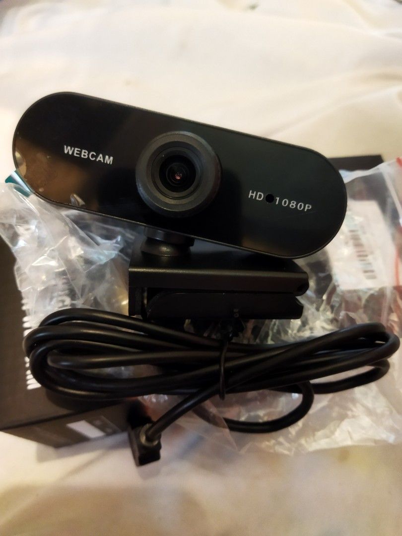 HD 1080P Webcam (Category: Webcams) located in Santa Rosa. Submitted by vanarkride29812 (Listing ID 1456789210, Image 1). Description: - HD 1080P resolution for clear video - Plug and play setup, no drivers needed - Ideal for video calls, online meetings, and streaming - Built-in clip for easy mounting on monitors or laptops - Comes with a connecting cable - Sleek black color.