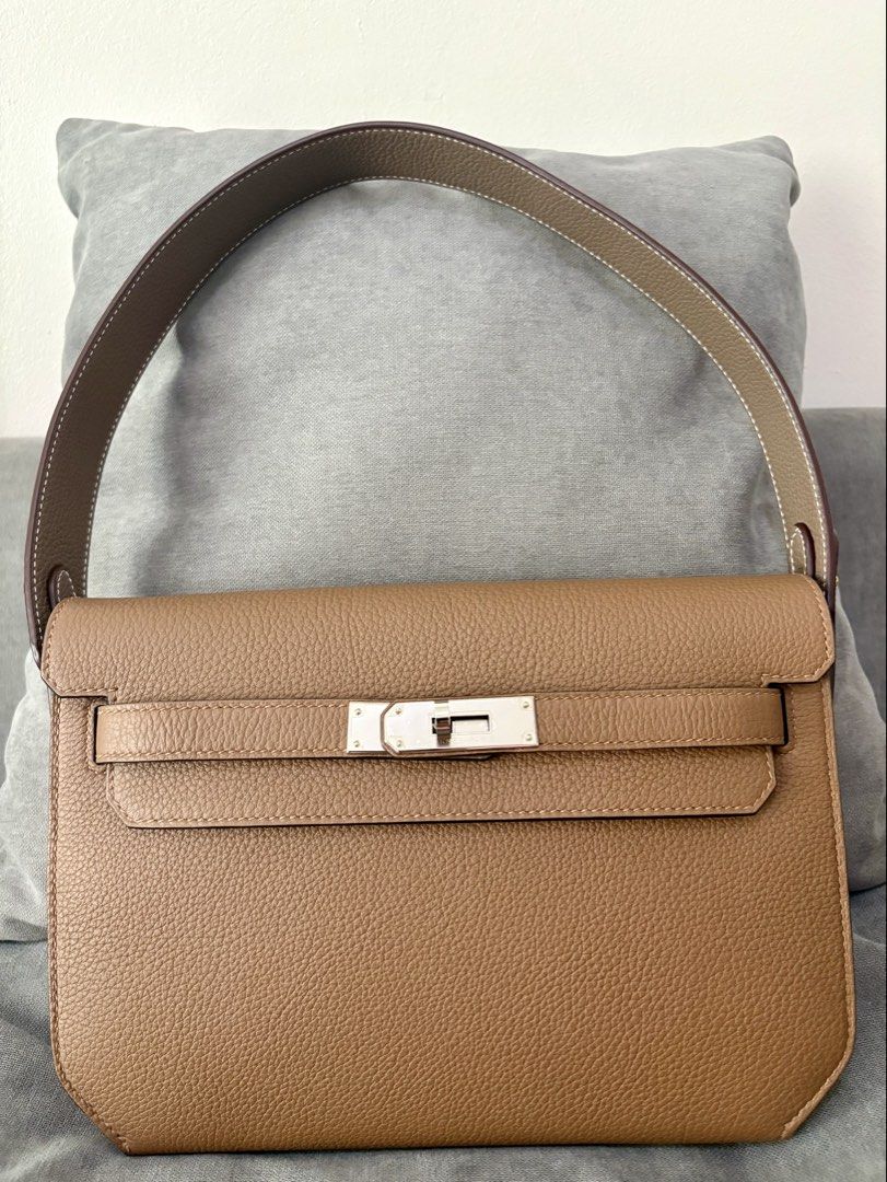 HERMES KELLY DEPECHES 25 ETOUPE (Category: Luxury Bags & Wallets) located in Taguig. Submitted by grailandsole (Listing ID 1456783375, Image 2). Description: BRAND NEW WITH RECEIPT Guaranteed authentic or your money back With receipt and Legitgrails and Dr. Runway authentication Azelan, PHW, Togo leather, with stickers 💯% intact With box, paperbag, dustbag, ribbons, care cards, receipt, original Hermes wrist strap and third party conversion stra