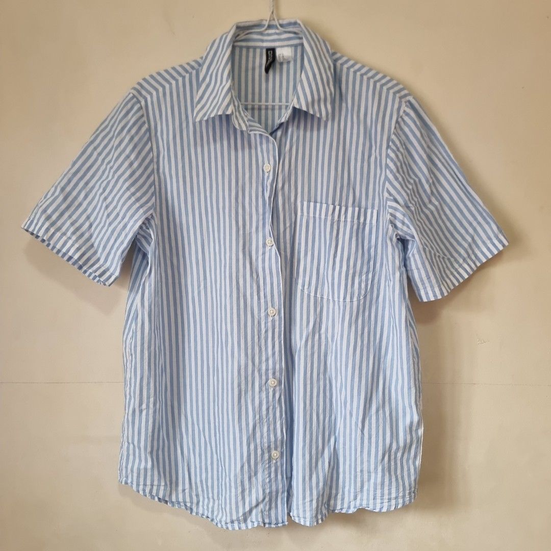 H&M Blue & White Striped Cotton XS Shirt (Category: Shirts) located in Pasig City. Submitted by lesmitch (Listing ID 1456835639, Image 1). Description: ▪︎ L: 28 inc. | W: 20.5 inc. ~ Check all photos for the item's actual condition and measurements ~ Payment is via gcash, pay maya or bdo ~ Shipping is via lalamove, grab, j&t or you can book your own preferred courier ~ There could be a slight difference in color due to lighting conditions. Please