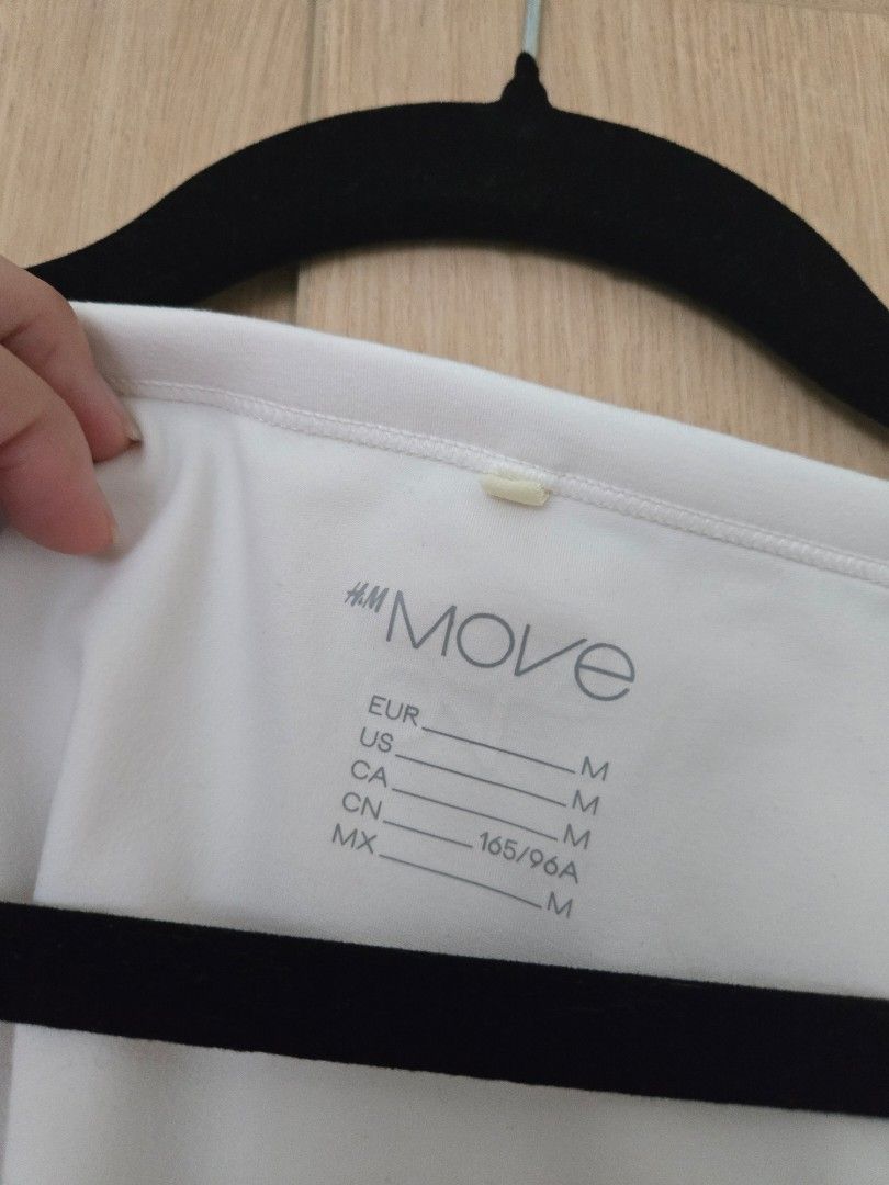 H&M Move White Cropped Shirt (Category: Activewear) located in Quezon City. Submitted by samcas (Listing ID 1456886216, Image 2). Description: H&M Move white cropped tee. Comfy, breathable fabric. Perfect for gym or everyday style..