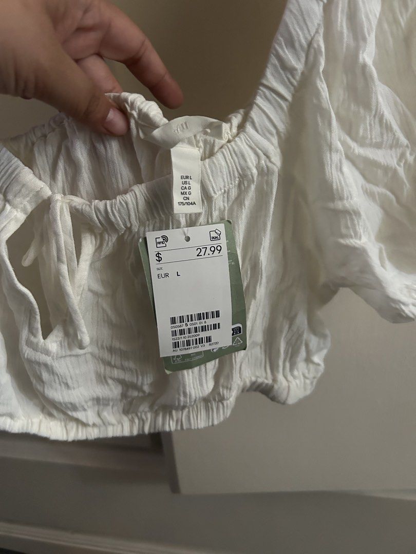 H&M White Puff Sleeve Tie Front Crop Top (Category: Blouses) located in General Santos City (Dadiangas). Submitted by mikailamondragon (Listing ID 1456819115, Image 2). Description: NBU. $27 on tag but selling low for 500 only. .