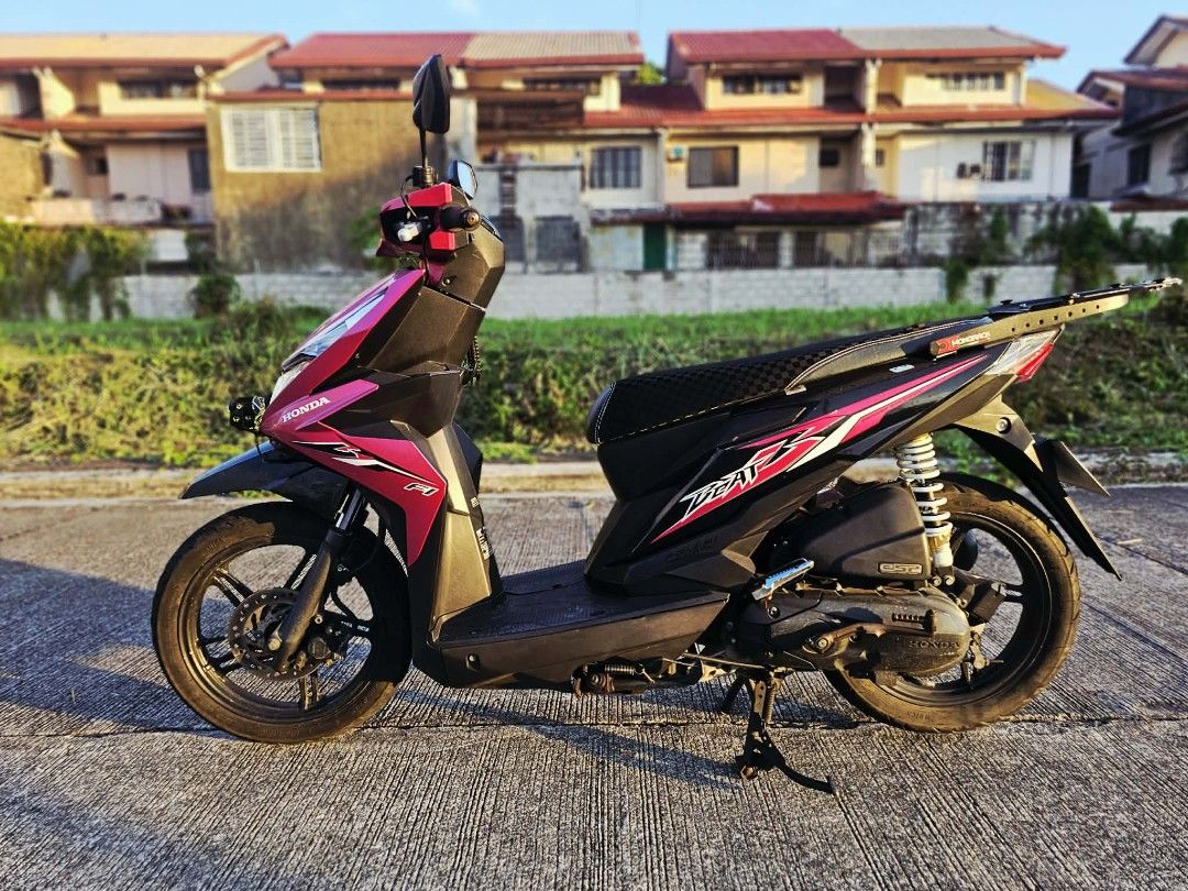 Honda Beat Fi Pink Scooter 2018 (Category: Motorbikes for Sale) located in Binan City. Submitted by Sunny_RJ (Listing ID 1456918917, Image 2). Description: Honda Beat Fi 2018 QUICK SPECS:Engine: 110cc eSP Engine (Fuel Injected - Super Tipid!)Transmission: Fully Automatic (V-Matic)Tires: Tubeless (Front: 80/90-14 | Rear: 90/90-14)Starter: Smooth ACG Starter (Electric & Kick Start)Weight: Lightweight at 90kg (Very easy to handle) Mileage (Odometer)
