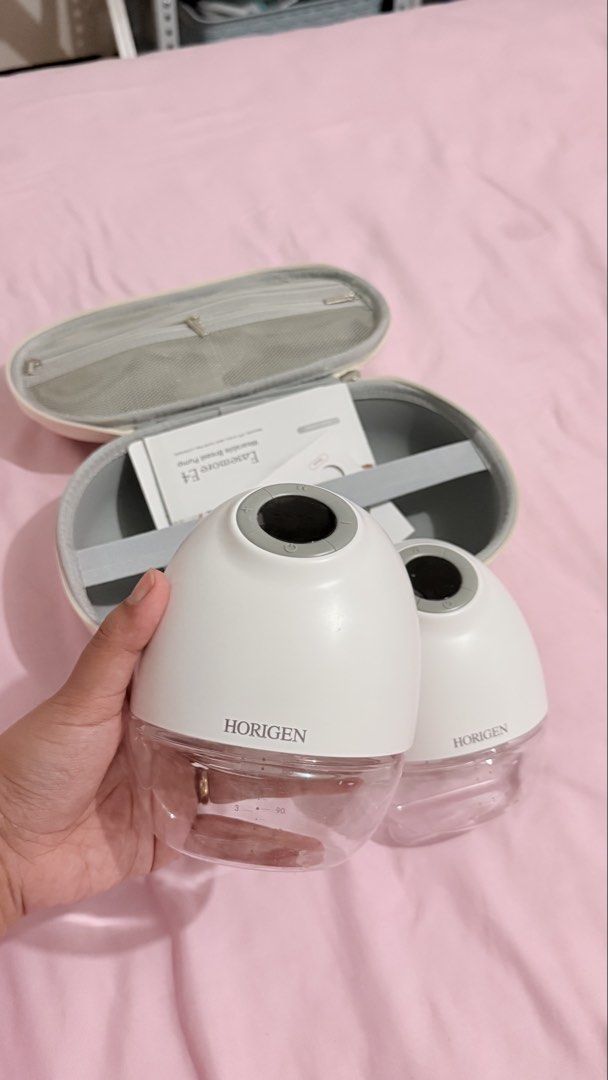 Horigen Easemore E4 Wearable Breast Pump (Category: Breastfeeding & Bottle Feeding) located in Quezon City. Submitted by rratirazona (Listing ID 1456898261, Image 2). Description: Horigen Easemore E4 Wearable Breast Pump (2 pcs) - Used but not abused, bought last May - Complete accessories - Selling for only P 2,400 - FREE breast milk storage bags for sure buyer - Buyer will shoulder delivery fee 😊 RFS: Di na po ginagamit .