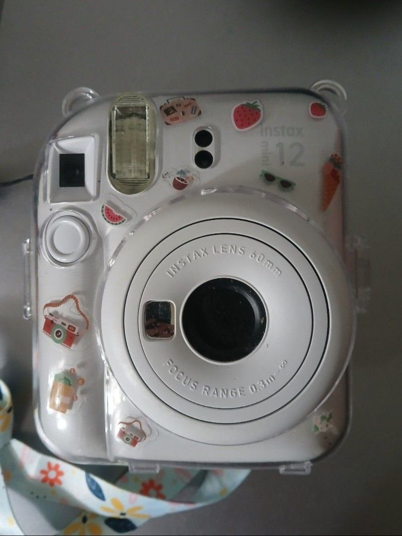Instax Mini 12 (Category: Cameras) located in Sorsogon. Submitted by yka_declutters (Listing ID 1456874904, Image 3). Description: rfs: i don’t use it anymore comes with a strap and case.