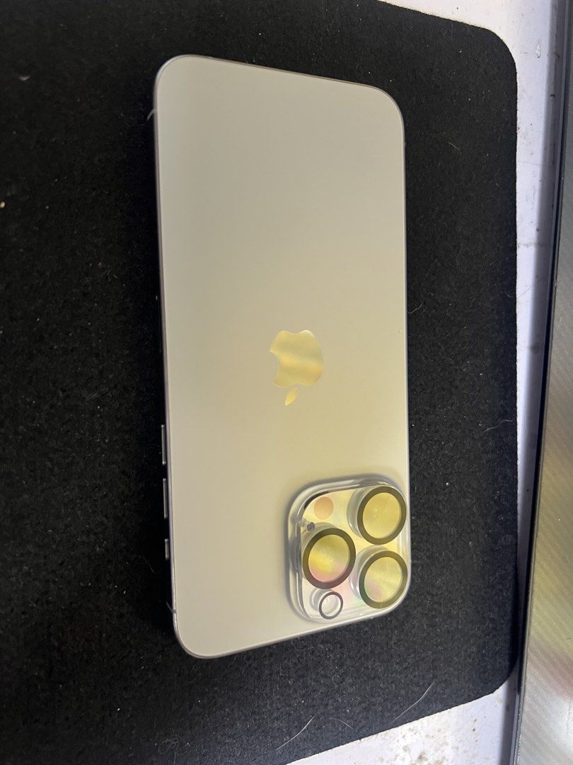 Iphone 15 Pro Max 256 GB (Natural Titanium) (Category: iPhone 15 Series) located in Baguio. Submitted by rogdj (Listing ID 1456823928, Image 3). Description: Iphone 15 pro max 256Gb (Natural Titanium) RFS. Downgrade Issue is the upper earpiece speaker hindi gumagana bigla nalang naging ganun hindi naman na hulog ever other than that gumagana lahat from face ID, cameras, microphones, charging port, buttons are all crisp, super kinis pa neto, alaga