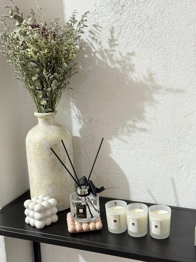 Jo Malone London Scented Candles Set (Category: Home Fragrance) located in Taguig. Submitted by chloe_clothingco. (Listing ID 1456890487, Image 3). Description: - Set of 3 Jo Malone London scented candles - Scents included: English Pear & Freesia, Wild Bluebell, Wood Sage & Sea Salt - Perfect for gifting or personal use - Adds a lovely fragrance to any space - Comes in original packaging.