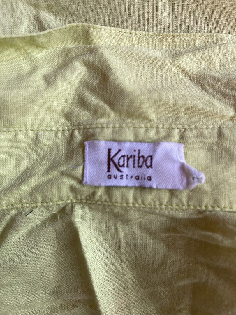Kariba Australia Light Yellow Button-Up Shirt (Category: Tshirts & Polo Shirts ) located in Toledo. Submitted by klnmia (Listing ID 1456825272, Image 2). Description: - Light yellow shirt from Kariba Australia - Short sleeves with a collared neckline - Button-up front - Ideal for casual outfits or layering.