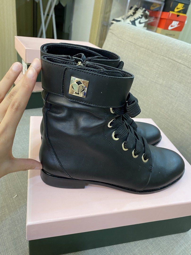 Kate Spade Black Leather Lace-Up Ankle Boots (Category: Boots) located in Cebu City. Submitted by jnnwright (Listing ID 1456835558, Image 3). Description: - Brand: Kate Spade - Material: Black Leather - Style: Ankle Boots - Closure: Lace-up front with gold hardware, side zipper, fold-over cuff with buckle - Sole: Flat - Features: Easy on/off, stylish fold-over cuff - Occasion: Great for everyday wear.
