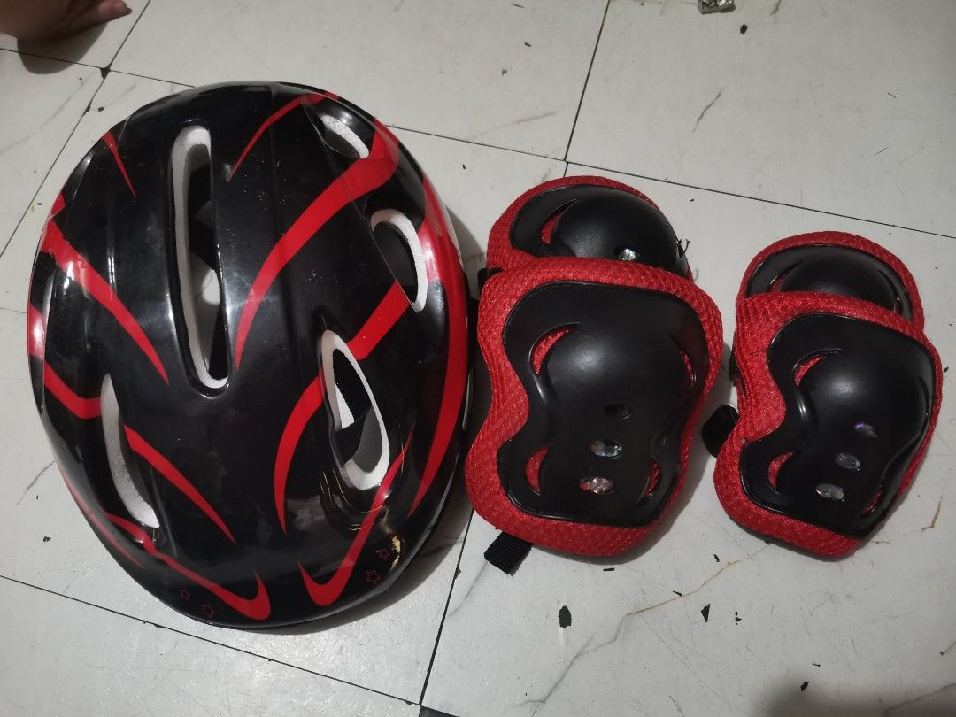 Kids Helmet and Knee/Elbow Pads Set (Category: Other Babies Going Out Needs) located in Quezon City. Submitted by c_and_a_haus (Listing ID 1456857036, Image 1). Description: - Black helmet with red accents - Includes matching knee and elbow pads - Adjustable straps for a secure fit - Ideal for cycling, skateboarding, or scootering - Protects your child during outdoor activities - All items are ready for a new owner.
