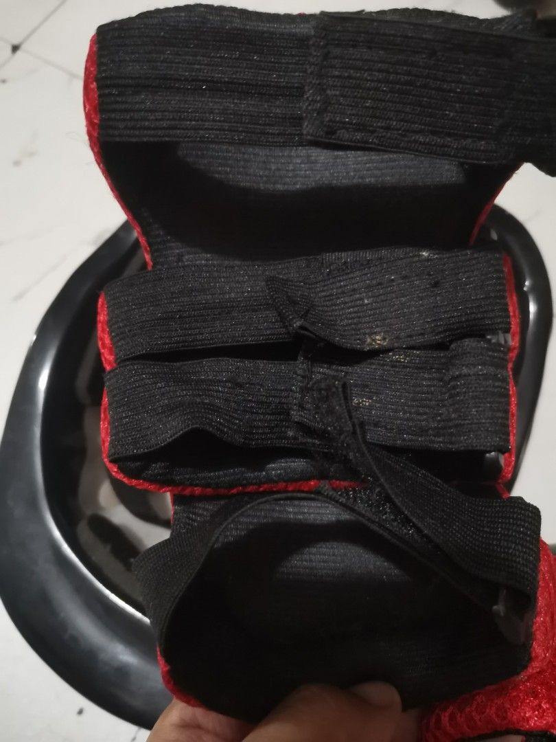 Kids Helmet and Knee/Elbow Pads Set (Category: Other Babies Going Out Needs) located in Quezon City. Submitted by c_and_a_haus (Listing ID 1456857036, Image 3). Description: - Black helmet with red accents - Includes matching knee and elbow pads - Adjustable straps for a secure fit - Ideal for cycling, skateboarding, or scootering - Protects your child during outdoor activities - All items are ready for a new owner.