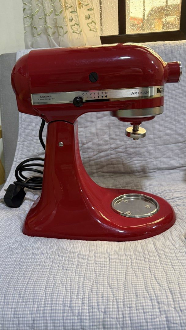 KitchenAid Artisan Red Stand Mixer with Attachments (Category: Hand & Stand Mixers) located in Quezon City. Submitted by amogz (Listing ID 1456944841, Image 3). Description: - Red KitchenAid Artisan Stand Mixer - Includes stainless steel bowl, dough hook, flat beater, and wire whisk - Powerful and reliable for all baking needs - Ideal for whipping cream, kneading dough, and mixing batters - A classic kitchen essential - 110volts.