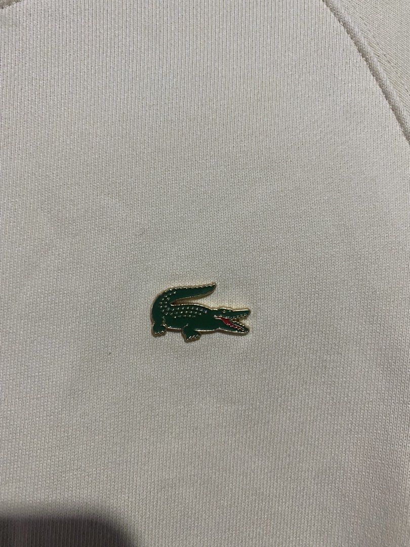 Lacoste pull over cream white (Category: Coats, Jackets and Outerwear) located in Manila. Submitted by sixbysix (Listing ID 1456932812, Image 2). Description: Dimes 19-20x25 Condition 10/10 Color rate 10/10 Issue none .