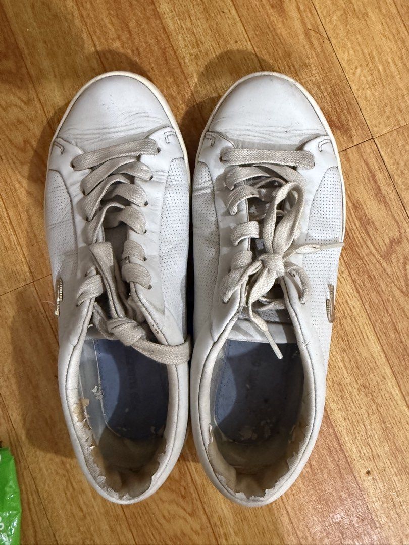 Lacoste sneakers (Category: Sneakers) located in Pasig City. Submitted by patrissia1129 (Listing ID 1456912948, Image 2). Description: Original Lacoste Women’s Shoes 👟🤍 ✨ Original Lacoste ✨ Pre-loved / 2nd hand ✨ Size: ___ ✨ Still wearable and good for casual everyday use 📌 Please check photos for actual condition — may show signs of use, especially on the inner heel lining and some scuffing/discoloration. No box 💰 ₱500.