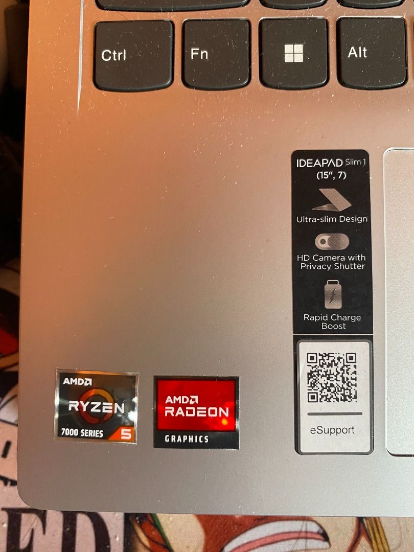 Lenovo Idea Pad Slim 1 (Category: Laptops & Notebooks) located in Caloocan City. Submitted by shunaaaaa (Listing ID 1456881009, Image 2). Description: Selling Lenovo Idea Pad Slim 1 RFS: di naman nagagamit masyado, only used it during my job hunting era for VA. Issue: Natuklap yung glue sa lower left ng screen, but all in all, still functional just like when it was first bougth in Dec. 2024. Still with box and charger, freebie is laptop stand wit