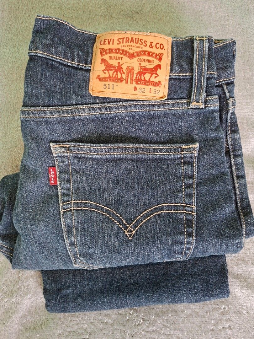 Levi's 511 Slim Fit Jeans W32 L32 (Category: Jeans) located in Lucban. Submitted by artjrmadj2 (Listing ID 1456861347, Image 1). Description: PRELOVED Classic Levi's 511 Jeans - Slim Fit - Size: W32 L32 - Color: Dark Wash Denim - Eco-friendly: Water<Less> technology (uses less water) - Closure: Button and zip fly - Features: Standard five-pocket styling - Style: Versatile staple for any wardrobe.