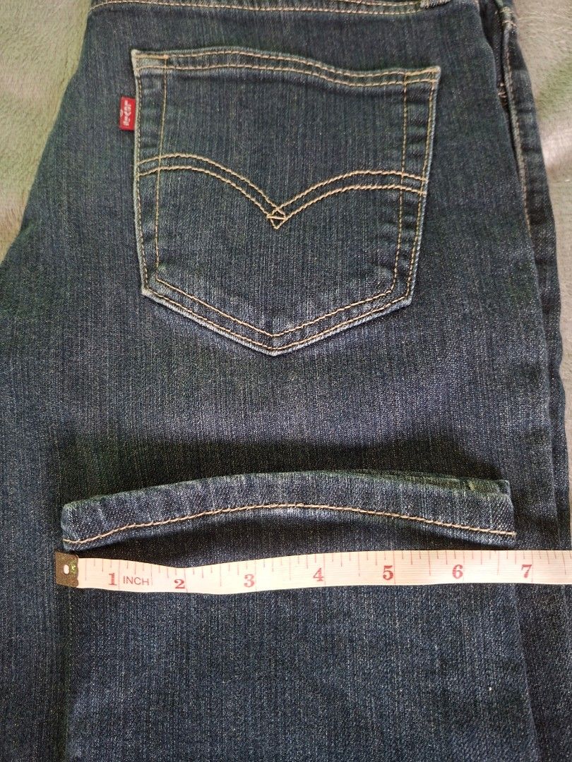Levi's 511 Slim Fit Jeans W32 L32 (Category: Jeans) located in Lucban. Submitted by artjrmadj2 (Listing ID 1456861347, Image 2). Description: PRELOVED Classic Levi's 511 Jeans - Slim Fit - Size: W32 L32 - Color: Dark Wash Denim - Eco-friendly: Water<Less> technology (uses less water) - Closure: Button and zip fly - Features: Standard five-pocket styling - Style: Versatile staple for any wardrobe.