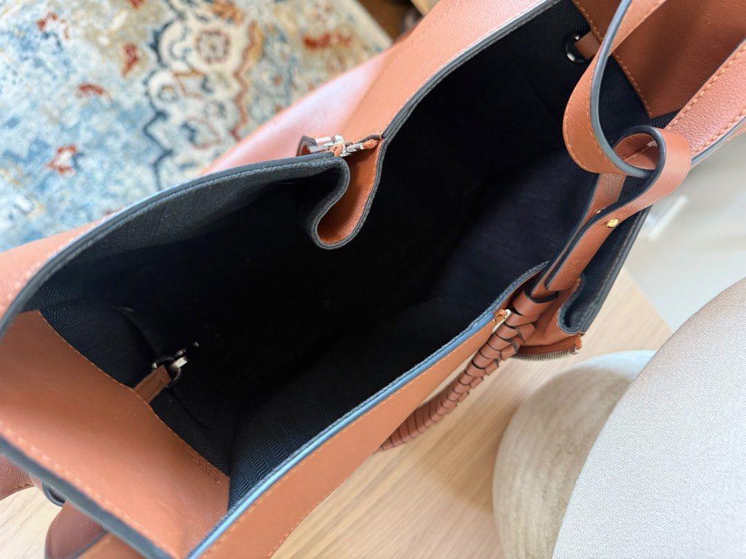 Loewe Puzzle Bag Tan Leather (Category: Luxury Bags & Wallets) located in Manila. Submitted by emceebee (Listing ID 1456789853, Image 3). Description: - Authentic Loewe Puzzle bag - Size: Medium - Color: Tan leather - Closure: Zipper with tassel detail - Style: Great everyday bag - Interior: Plenty of space .