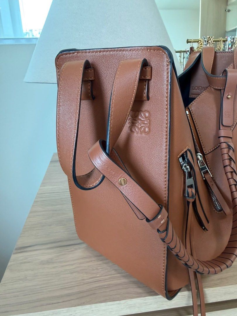 Loewe Puzzle Bag Tan Leather (Category: Luxury Bags & Wallets) located in Manila. Submitted by emceebee (Listing ID 1456789853, Image 1). Description: - Authentic Loewe Puzzle bag - Size: Medium - Color: Tan leather - Closure: Zipper with tassel detail - Style: Great everyday bag - Interior: Plenty of space .