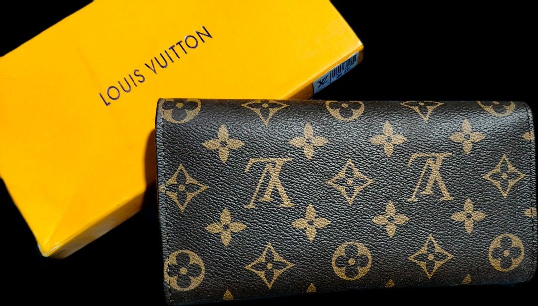 Louis Vuitton Long Wallet (Category: Luxury Bags & Wallets) located in Quezon City. Submitted by morningstar_52 (Listing ID 1456922560, Image 2). Description: - Classic Louis Vuitton monogram wallet - Multiple card slots for organization - Zippered pocket for coins - Secure snap closure - A timeless and essential accessory.