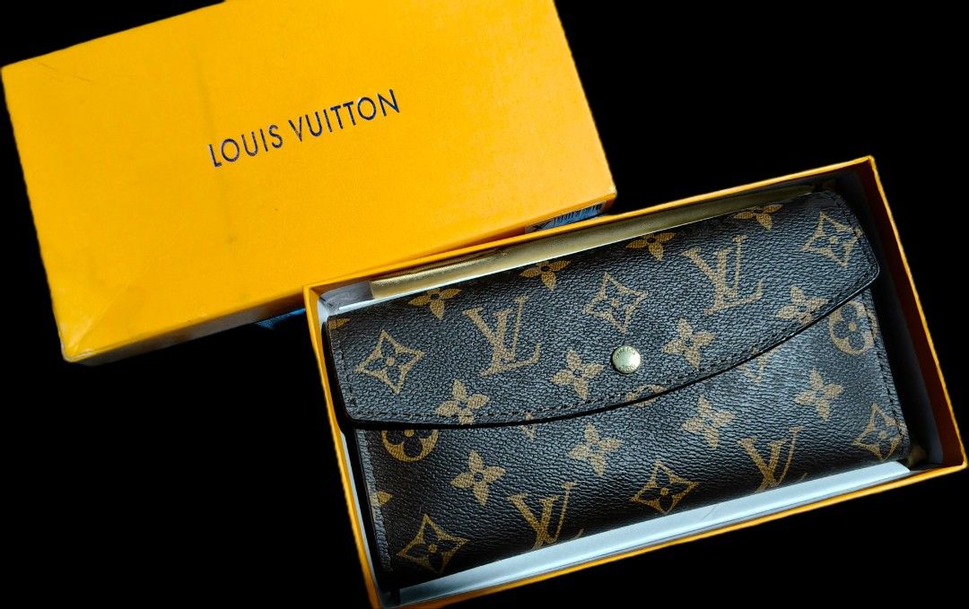 Louis Vuitton Long Wallet (Category: Luxury Bags & Wallets) located in Quezon City. Submitted by morningstar_52 (Listing ID 1456922560, Image 1). Description: - Classic Louis Vuitton monogram wallet - Multiple card slots for organization - Zippered pocket for coins - Secure snap closure - A timeless and essential accessory.