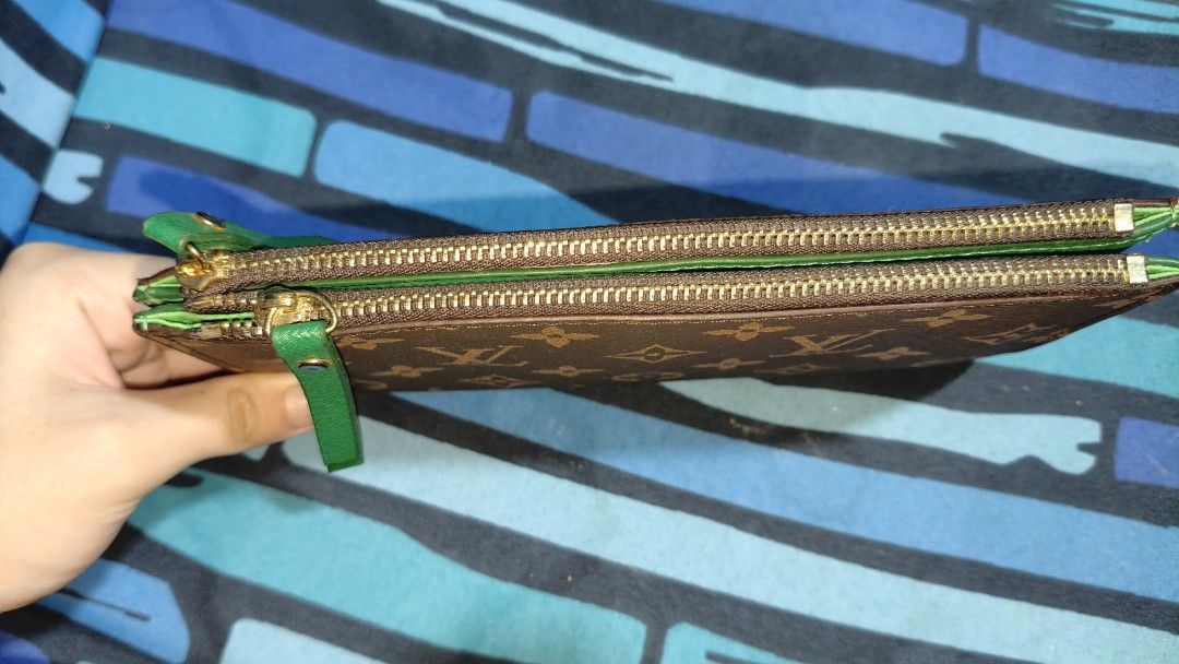 Louis Vuitton long wallet (Category: Luxury Bags & Wallets) located in Quezon City. Submitted by morningstar_52 (Listing ID 1456926654, Image 2). Description: - no flaws - Classic monogram canvas exterior - Vibrant green interior - Multiple card slots - Secure zipper closure - Ideal for organizing essentials - Stylish everyday accessory.