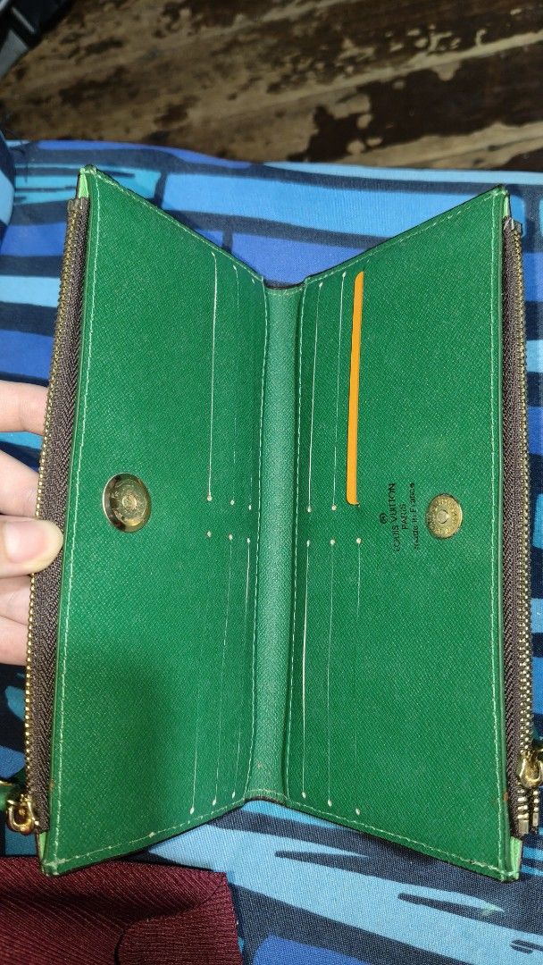 Louis Vuitton long wallet (Category: Luxury Bags & Wallets) located in Quezon City. Submitted by morningstar_52 (Listing ID 1456926654, Image 3). Description: - no flaws - Classic monogram canvas exterior - Vibrant green interior - Multiple card slots - Secure zipper closure - Ideal for organizing essentials - Stylish everyday accessory.