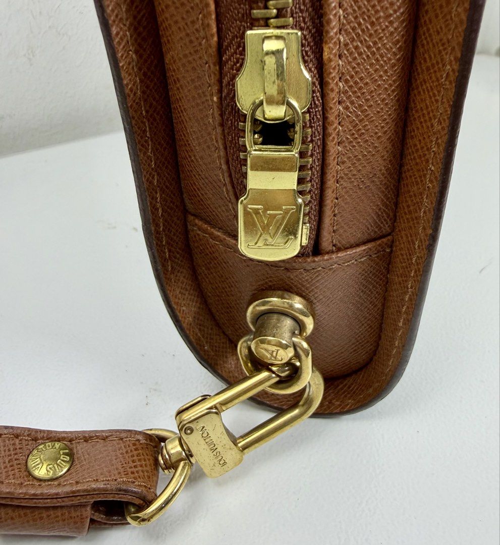 Louis Vuitton Monogram Orsay Clutch Bag (Category: Luxury Bags & Wallets) located in Manila. Submitted by importgoodiesph (Listing ID 1456824254, Image 2). Description: Louis Vuitton Monogram Orsay Clutch Bag - in good condition - dimensions: W - 24cm; H - 15.5cm; D - 6 cm - made in France - gold-tone hardwares - zipper closure on top - 1 exterior pocket, 1 interior pocket (both are sticky and peeling as seen on photos) - clutch bag only, no othe