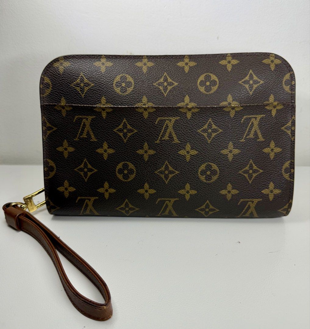 Louis Vuitton Monogram Orsay Clutch Bag (Category: Luxury Bags & Wallets) located in Manila. Submitted by importgoodiesph (Listing ID 1456824254, Image 1). Description: Louis Vuitton Monogram Orsay Clutch Bag - in good condition - dimensions: W - 24cm; H - 15.5cm; D - 6 cm - made in France - gold-tone hardwares - zipper closure on top - 1 exterior pocket, 1 interior pocket (both are sticky and peeling as seen on photos) - clutch bag only, no othe