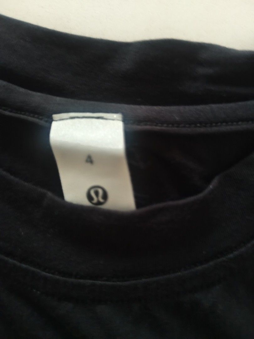 Lululemon Black Tank Top Size 4 (Category: Activewear) located in Muntinlupa City. Submitted by cezzy82 (Listing ID 1456844650, Image 3). Description: - Black Lululemon tank top - Sleeveless design - Size 4 - Ideal for workouts or casual wear - Comfortable and breathable fabric - Versatile: pairs easily with leggings or shorts.