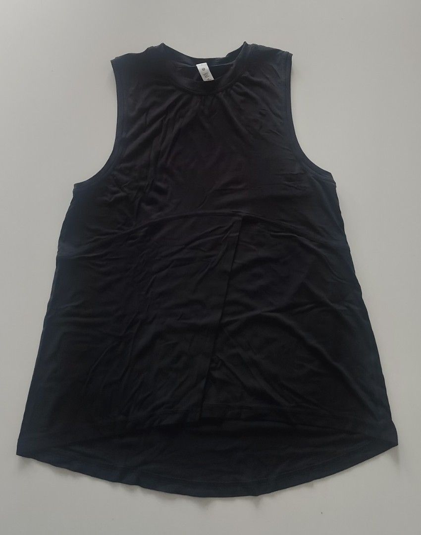 Lululemon Black Tank Top Size 4 (Category: Activewear) located in Muntinlupa City. Submitted by cezzy82 (Listing ID 1456844650, Image 1). Description: - Black Lululemon tank top - Sleeveless design - Size 4 - Ideal for workouts or casual wear - Comfortable and breathable fabric - Versatile: pairs easily with leggings or shorts.